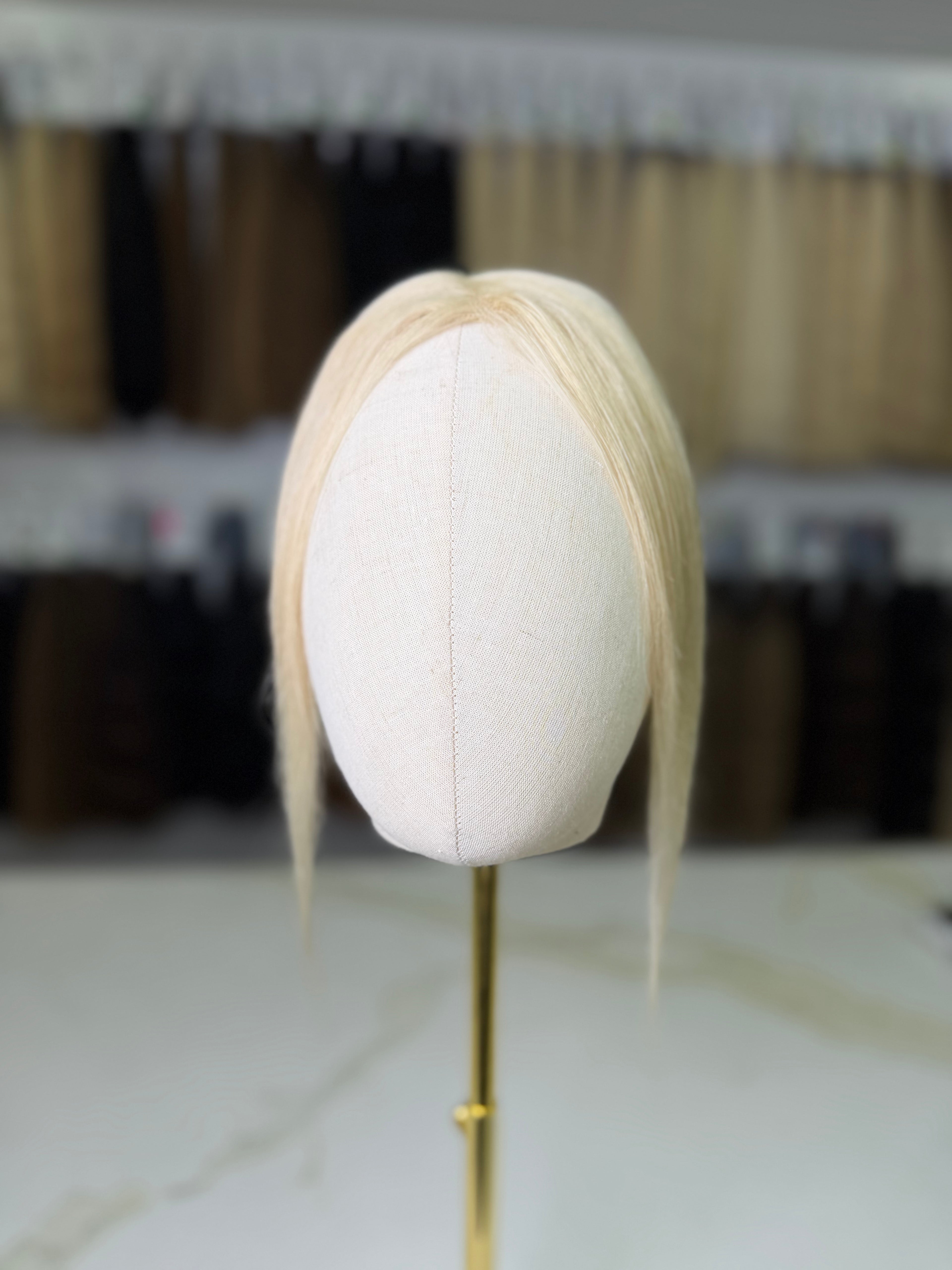 Slavic Gently Colored Blonde Curtain Bangs