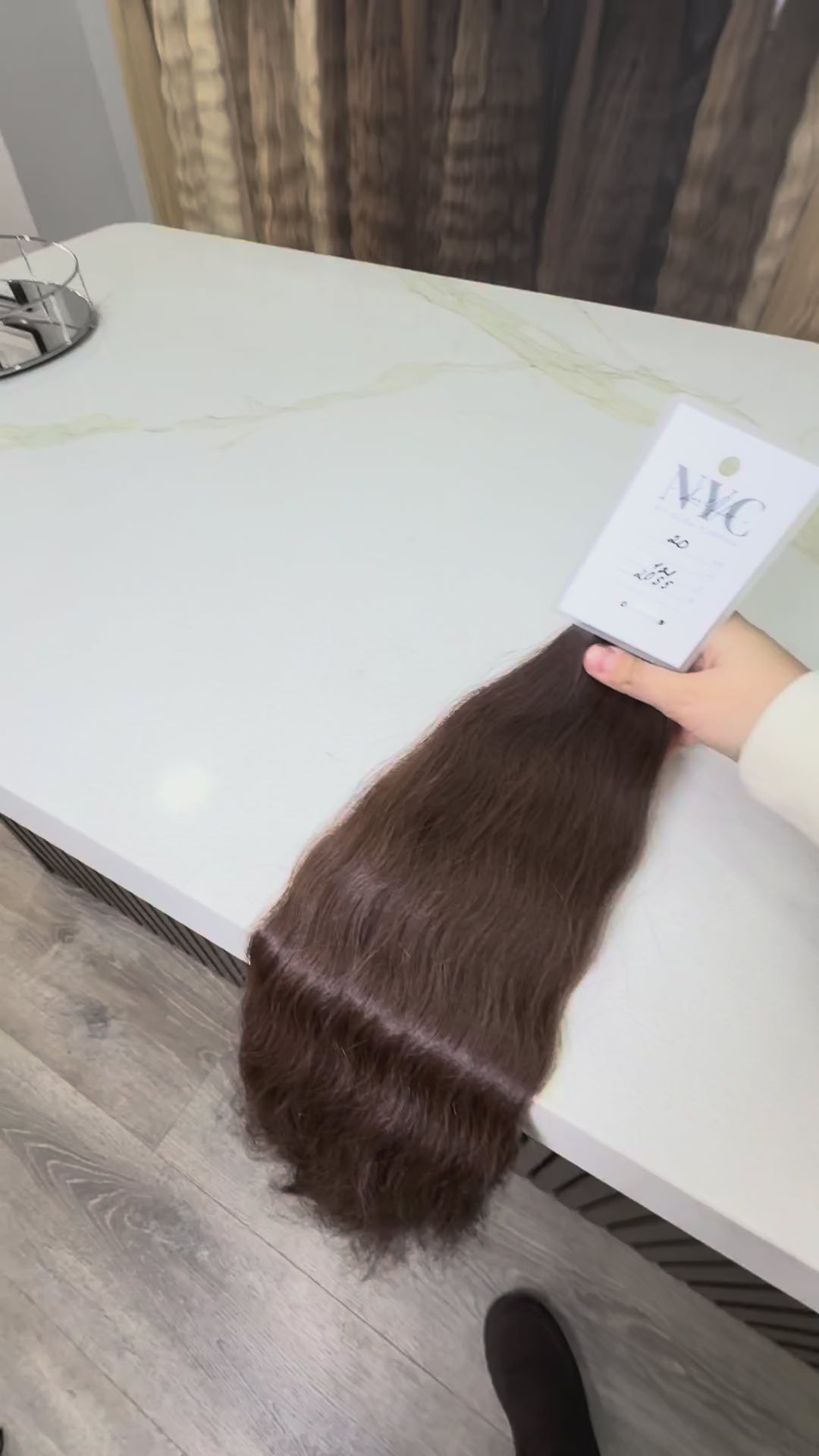 Russian Slavic bulk hair texture detail -  wavy pattern, brown color color, single donor ponytail