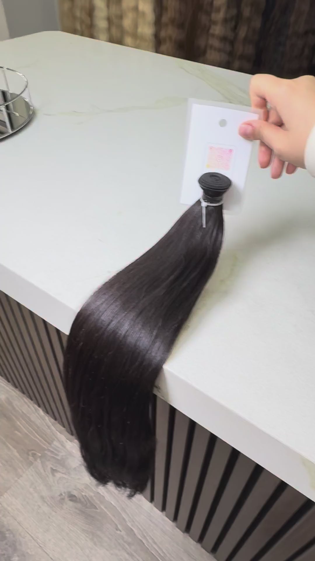 Russian Slavic weft hair ponytail video - dark brown wavy texture movement and shine demonstration