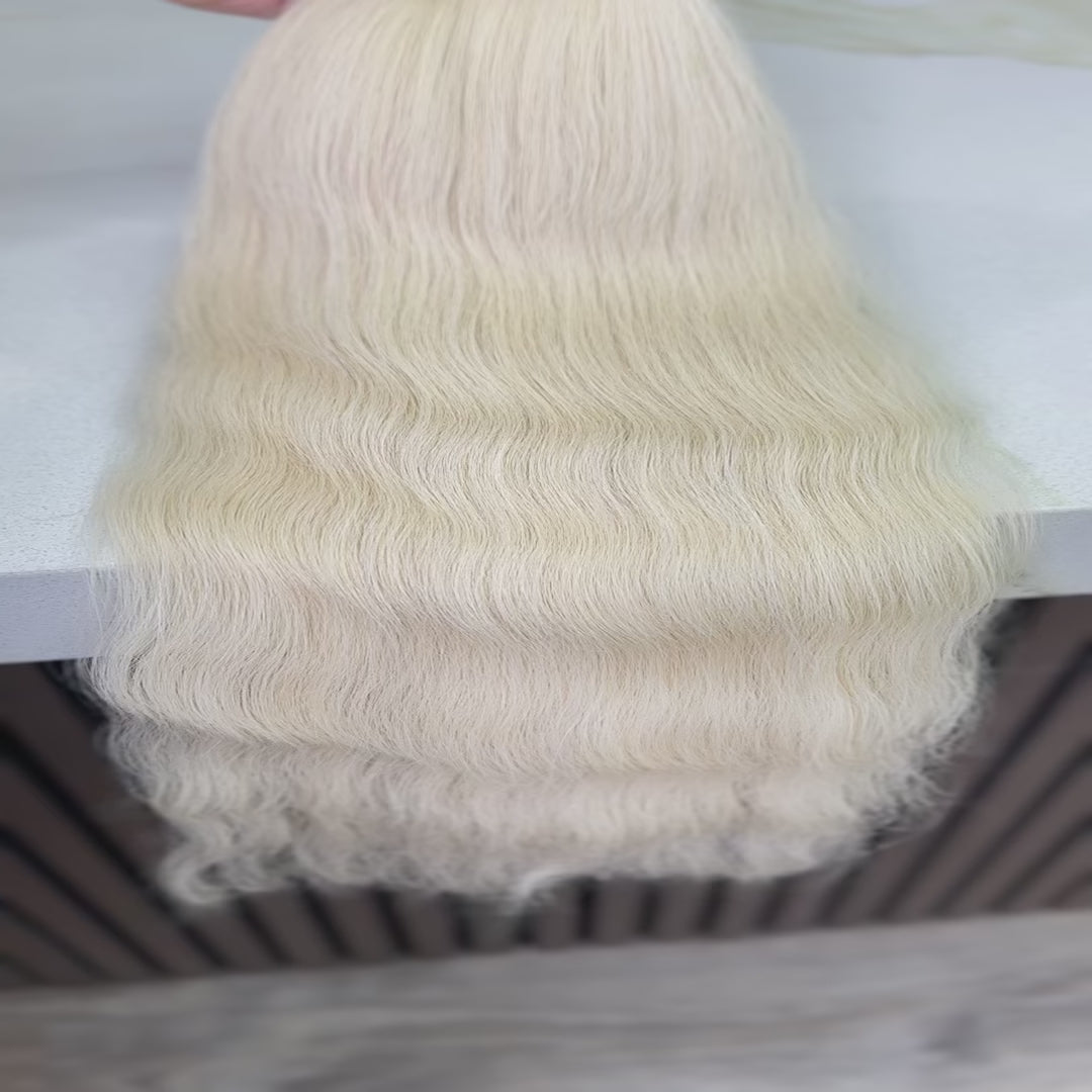 Luxury human hair extensions – Tape-in, virgin Slavic wavy, blonde hair, ultra-thick natural texture. By Olga Turkina. Shop at luxhairnyc.shop