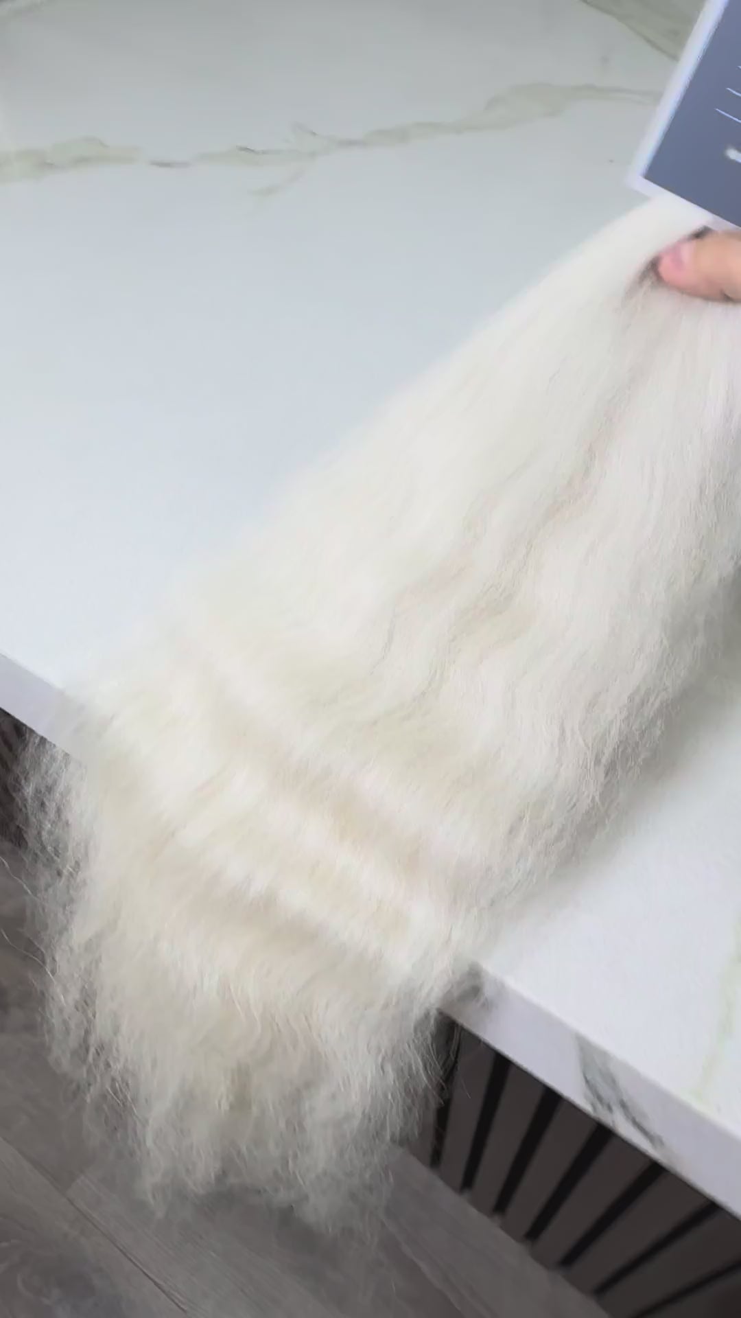 Russian Slavic bulk hair ponytail video - 24" cold blonde wavy texture movement and shine demonstration