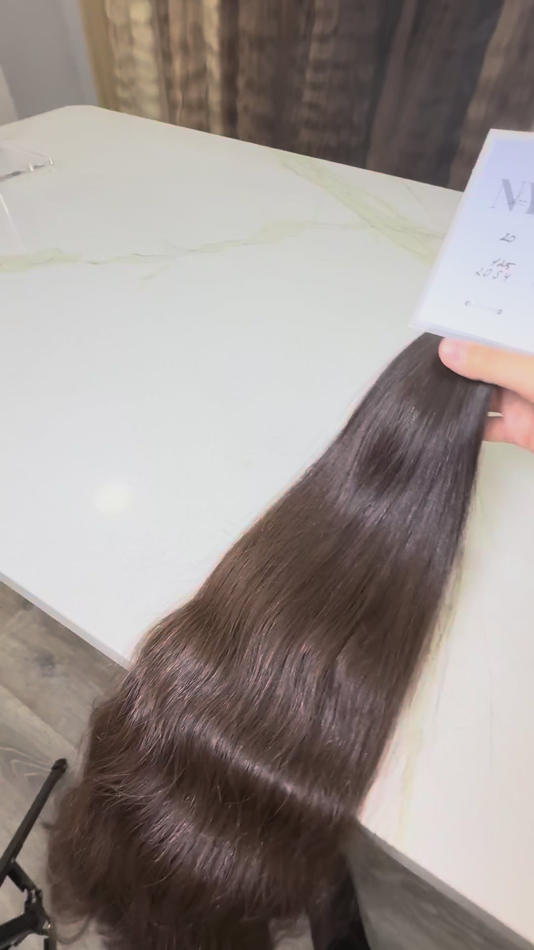 Russian Slavic bulk hair texture detail -  wavy pattern, brown color color, single donor ponytail
