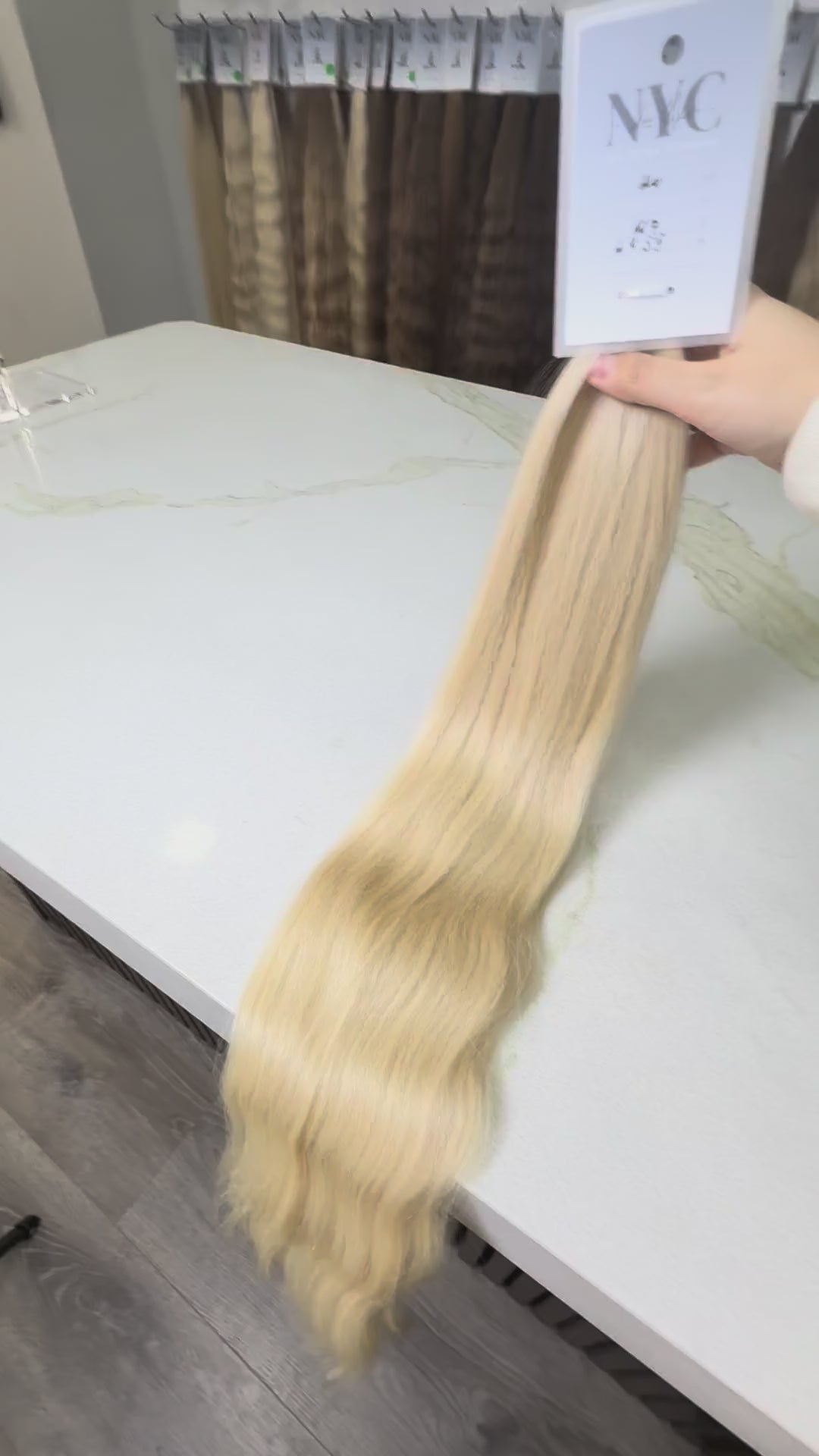 Russian Slavic bulk hair ponytail video - 24" warm blonde wavy texture movement and shine demonstration